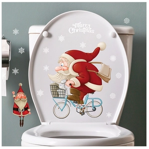 Détail d'autocollant Père Noël pour abattant de WC avec texte Merry Christmas et flocons