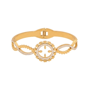 Elegant gold hollowed-out bangle with pavé crystal accents and a sleek hinged closure