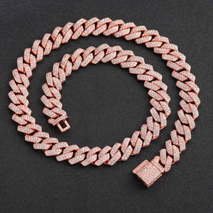 Rose gold hip hop Cuban link chain necklace with cubic zirconia pave on black background