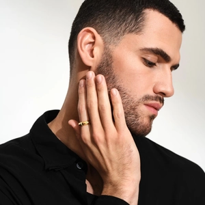 Elegant 18k gold plated stainless steel ring with black stone on model hand