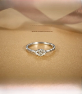 Close-up of S925 sterling silver marquise evil eye ring with pavé moissanite accents