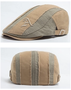Close-up of vintage camo beret with 3D embroidery and adjustable metal buckle