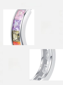 Detailed macro view showing the S925 hallmark and colorful zircon inlay on the silver ring