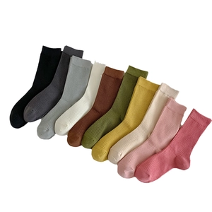 Pack of multi-color ribbed cotton socks featuring ten shades with vertical stripe texture