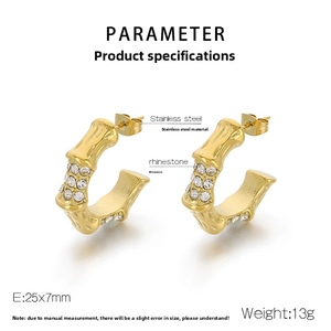 Detailed view of C-shaped 18K gold stainless steel earrings with sparkling rhinestones