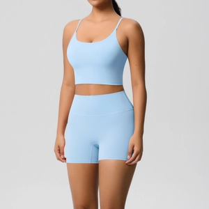 Close-up of light blue seamless yoga set featuring thin strap bra and high waist shorts