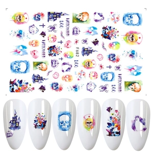 Detail of Halloween nail stickers featuring colorful skulls, ghosts and pumpkins model F682