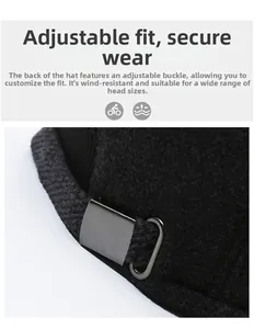 Close-up of adjustable metal buckle on black wool blend winter baseball cap for men