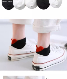 Detail of soft cotton low-cut socks featuring a 3D heart-shaped heel design in black