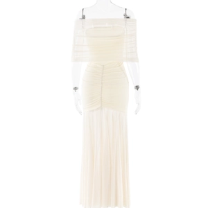 Detail of off-white tube top evening dress with layered mesh and pleated skirt details