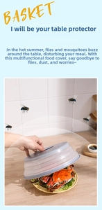Close-up of a foldable microwave plate cover over a seafood dish to prevent flies
