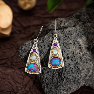 Bohemian geometric lapis lazuli earrings with vintage hollow metal hanging on volcanic rock