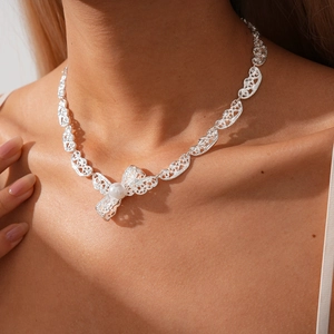 Elegant Hollow Lace Bowknot Pendant Necklace Alloy With Imitation Artificial Pearl Niche Style Fashion Accessory For Women