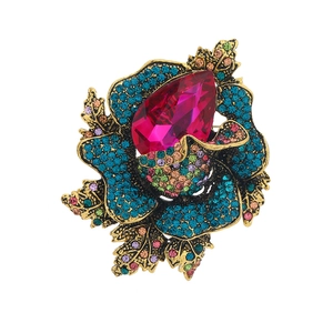Luxurious antique gold flower brooch with colorful rhinestones and rose red crystal drop