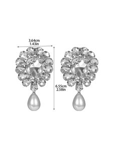 Detail view of crystal flower earrings with teardrop pearls and size 3.64x6.55cm