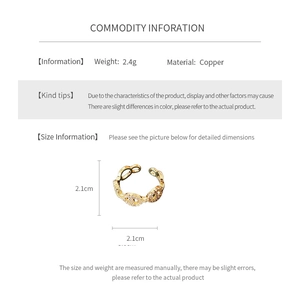 Technical drawing showing 2.1cm size and 2.4g weight of the gold plated copper ring