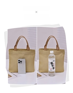 Canvas tote bag size comparison with smartphone and bottle showing large capacity