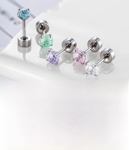 Macro shot of 4mm zircon cartilage earrings made of surgical titanium steel with 5 colors