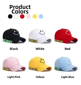 Detailed view showing baseball caps in six colors with smile embroidery and straps