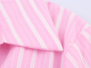 Close-up of the pink and white striped shirt collar with detailed cotton stitching