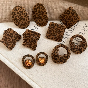 Vintage leopard print earrings in geometric shapes with velvet flocking and amber crystals