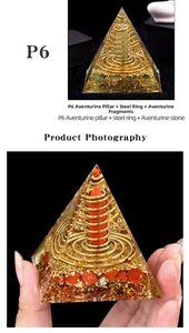 Macro detail of Orgone Pyramid with Green Aventurine crystal and copper coil spiral