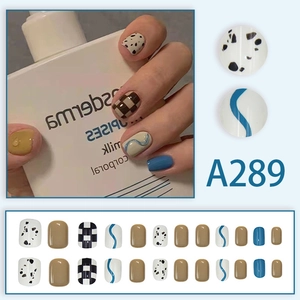 Short square press-on nails with cow print, checkerboard and wave patterns in set A289