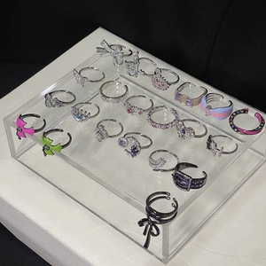 French style zircon butterfly open rings with crystal floral accents on display