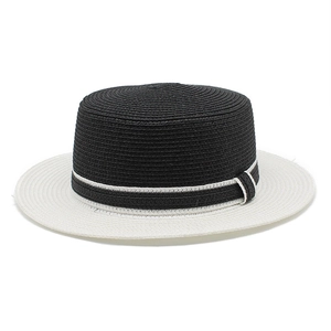 Contrast flat top boater hat with black straw crown, white brim and striped ribbon band