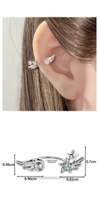 Detail showing the inner diameter of the angel wing and star ear cuff with blue rhinestone