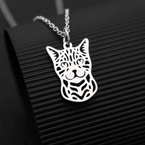 Sleek silver cat head silhouette pendant necklace with a minimalist hollowed-out design