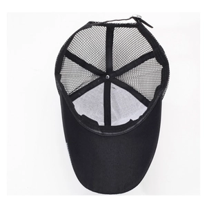 Detail view of the breathable mesh backing and adjustable metal buckle on black baseball cap