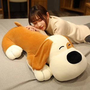 Detailed view of extra-large plush dog pillow with soft texture in a home setting