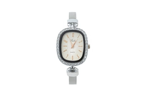 Detail of silver mesh band watch with rhinestone bezel and rose gold numbers
