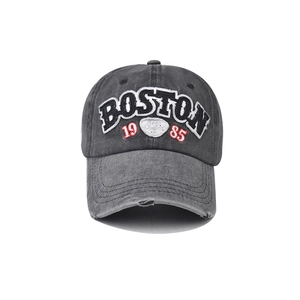 Detail of Boston 1985 3D embroidery on vintage washed cotton baseball cap with distressed brim