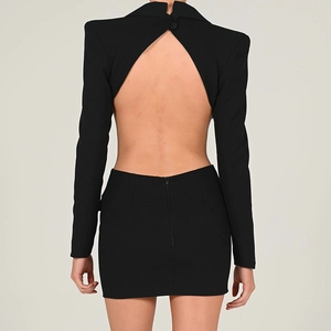 Detail view showing a large backless cut-out design on a black long-sleeve mini dress