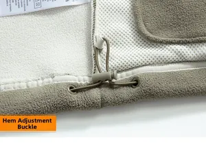 Close-up of adjustable hem with plastic toggle and bungee cord on thermal fleece jacket