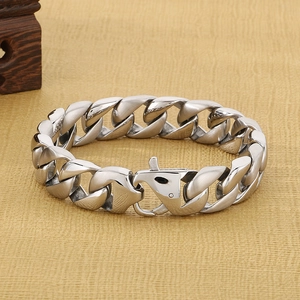 Close-up of matte stainless steel Cuban chain with unique bird head buckle design