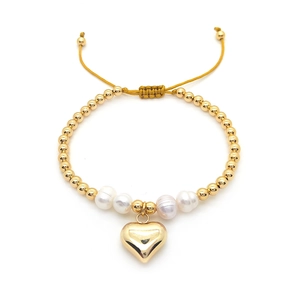 Baroque natural pearl heart bracelet with 18K gold beads and adjustable woven cord