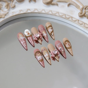 Faux ongles 5D motif ours avec nœuds 3D et strass en cœur, forme stiletto élégante