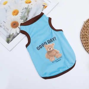 Detail of blue mesh pet vest with teddy bear print and Good Day lettering