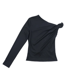 Close-up of the knot detail on the one-shoulder black long sleeve slim-fit tee shirt