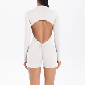 Close-up of heart-shaped open back and ruched booty detail on yoga romper jumpsuit