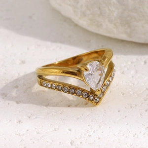 Close-up of 18K gold plated double layer crown ring with pear shaped crystal detail