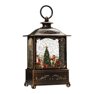 Vintage bronze Christmas tree lantern music box with snow globe and elf figurine inside