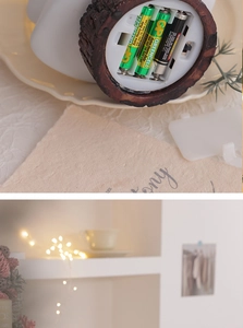 Detail of the battery compartment and warm LED lighting effect for Christmas decor
