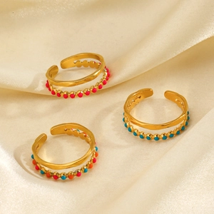Three-piece gold adjustable enamel rings set with colorful beads on white silk