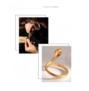 Macro detail of the 18K gold plated snake ring showing intricate scale textures