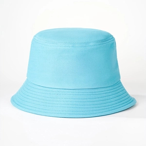 Detailed close-up of sky blue cotton bucket hat showing the twill fabric texture and stitching