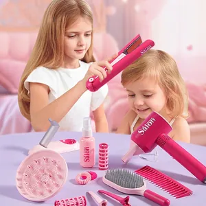 Pink hair salon toy set with hair dryer and styling accessories for girls' role play